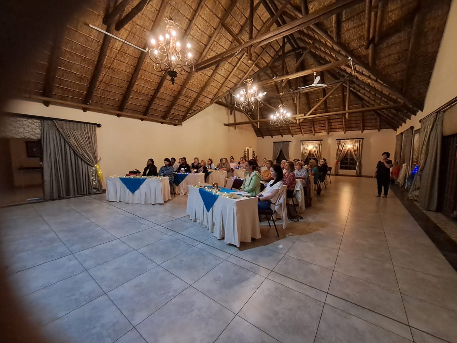 Gathered together under the thatched hall